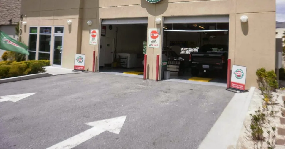 The drive-in bays at the Reno Northwest service center with the entry arrows painted on the pavement