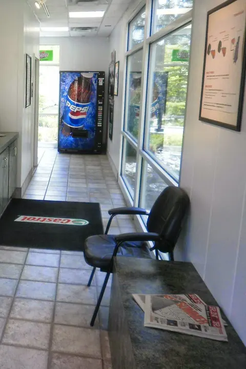 The waiting room at the Reno Northwest service center with chairs by the windows
